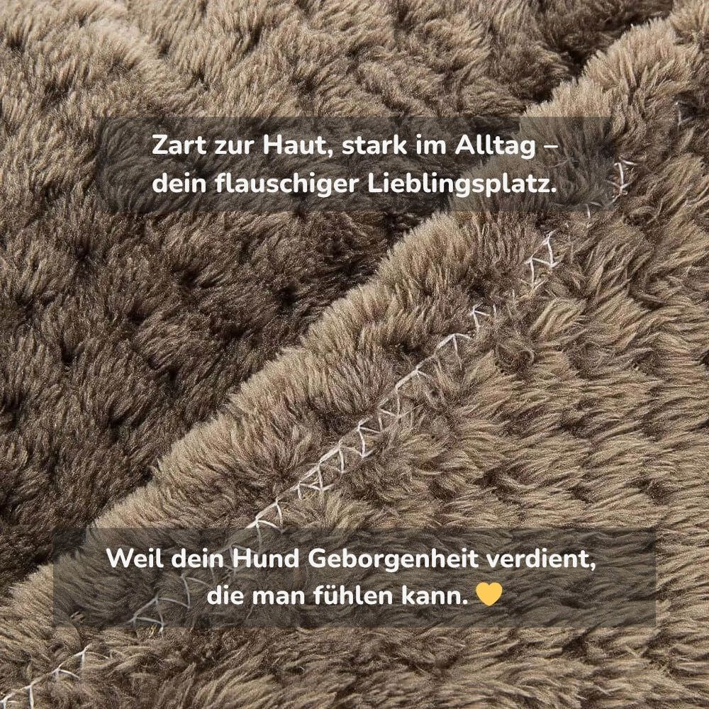 Detailaufnahme einer flauschigen Hundedecke – weiches, strapazierfähiges Material für Geborgenheit und Komfort bei HUNDESCHATZ