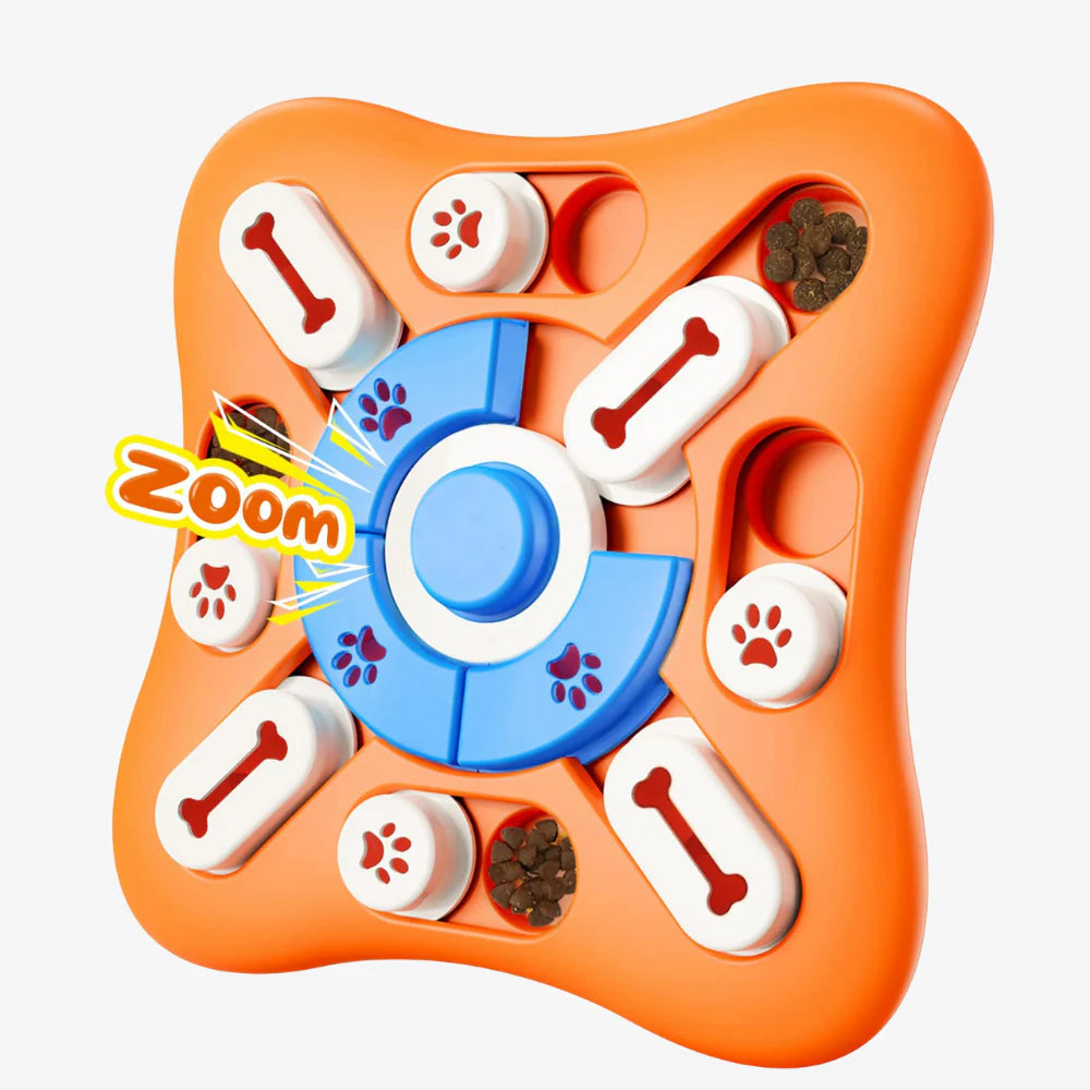 Oranges Intelligenzspielzeug für Hunde mit Zoom-Markierung, sichtbare Fächer mit Trockenfutter und Pfoten- sowie Knochenmotiven.